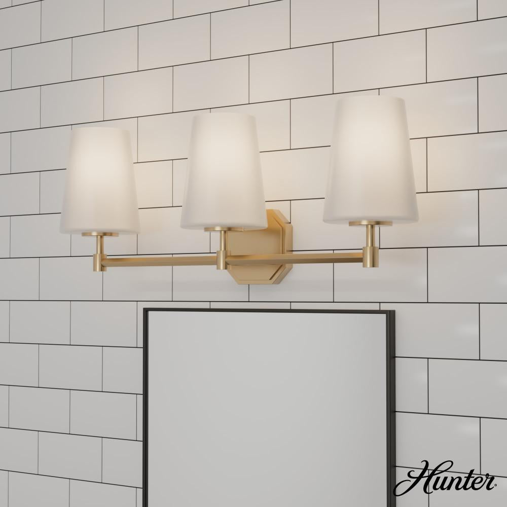 Hunter Nolita Alturas Gold with Cased White Glass 3 Light Bathroom Vanity Wall Light Fixture
