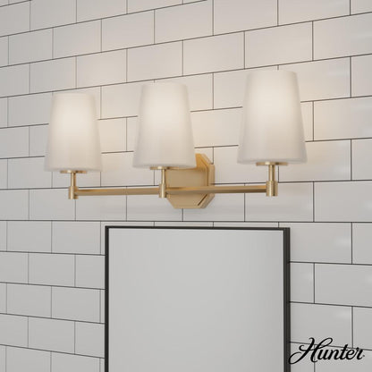 Hunter Nolita Alturas Gold with Cased White Glass 3 Light Bathroom Vanity Wall Light Fixture